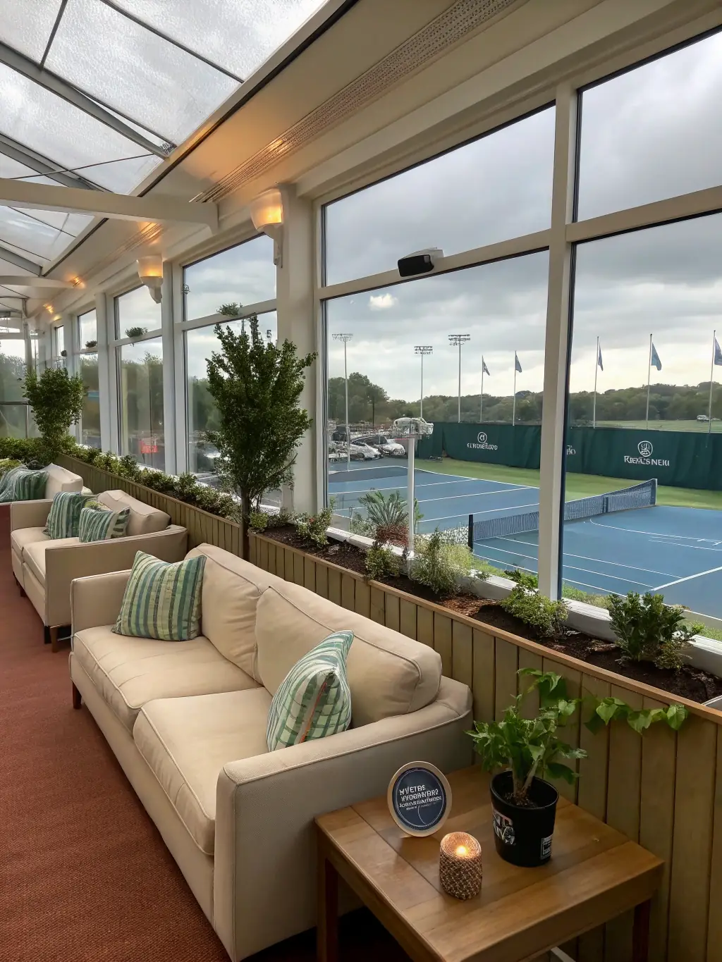 A comfortable and well-equipped clubhouse at CREULLOIS TENNIS CLUB, providing a relaxing space for members to socialize and unwind after a match.